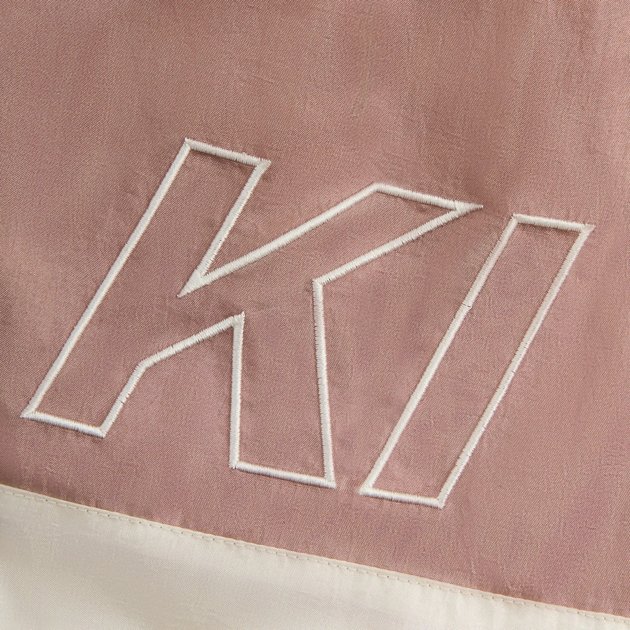 Front material logo View of Kith Washed Turbo Dusty Mauve Shorts KHM060983-603